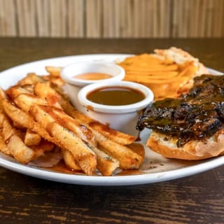 Jerk chicken coco bread sandwich
