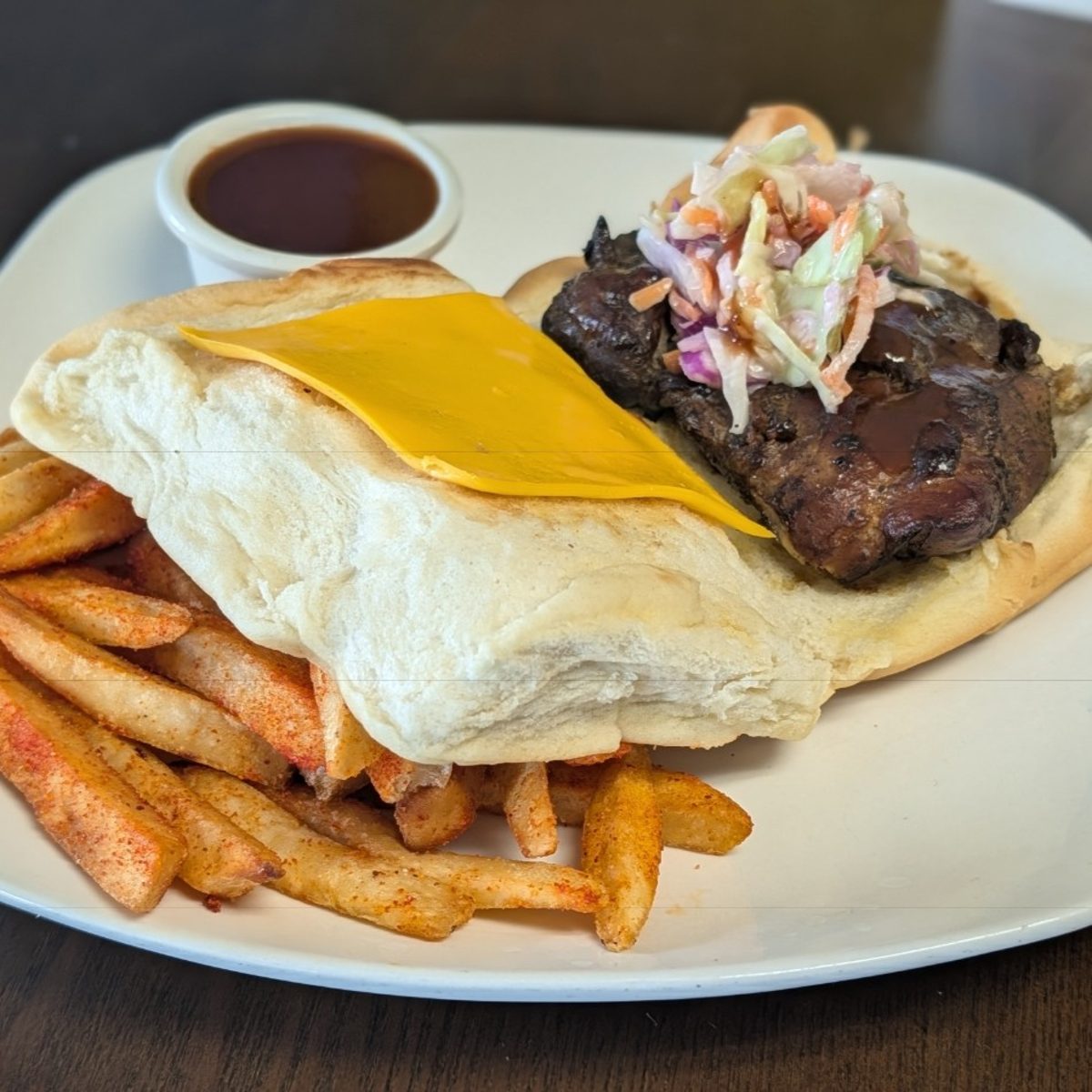 Jerk chicken coco bread sandwich