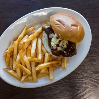 Jerk chicken coco bread sandwich